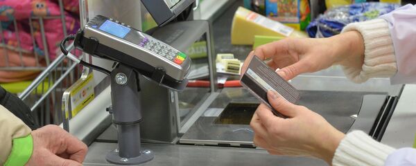 Оплата продуктов на кассе, архивное фото - Sputnik Беларусь