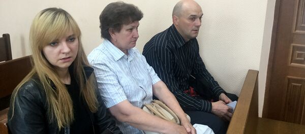 Родственники погибшей в ТЦ женщины - Sputnik Беларусь