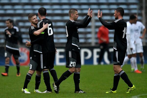 Игроки сборной Беларуси радуются победе в товарищеском матче между сборными командами Беларуси и Новой Зеландии - Sputnik Беларусь
