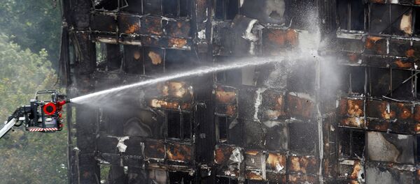 Сгоревший в Лондоне дом Сгоревший в Лондоне дом - Sputnik Беларусь