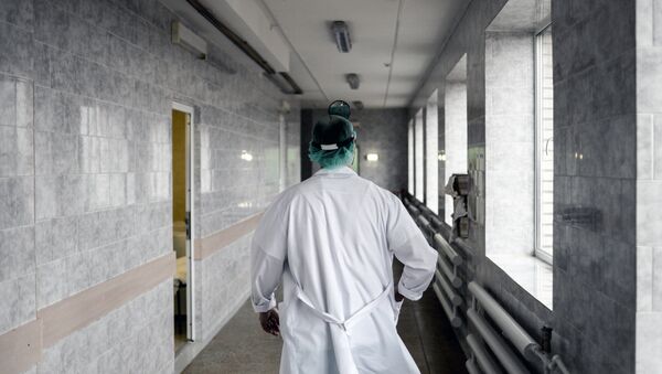 Медик в больнице, архивное фото - Sputnik Беларусь