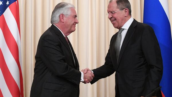 Министр иностранных дел РФ Сергей Лавров и Государственный секретарь США Рекс Тиллерсон (слева) - Sputnik Беларусь