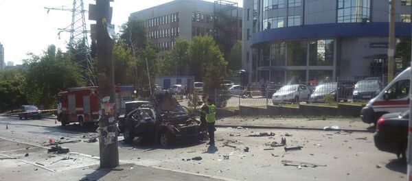 Взрыв автомобиля в Киеве 27 июня - Sputnik Беларусь