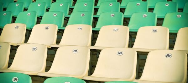 Сиденья на стадионе, архивное фото Сиденья на стадионе, архивное фото - Sputnik Беларусь