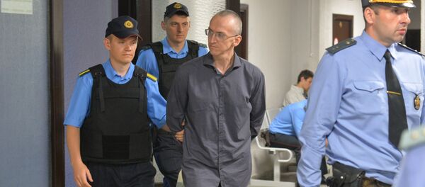 Обвиняемый экс-священник Константин Бурыкин Обвиняемый экс-священник Константин Бурыкин - Sputnik Беларусь