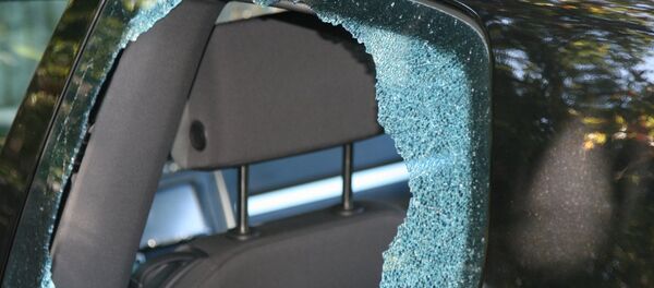 Разбитое стекло в машине, архивное фото Разбитое стекло в машине, архивное фото - Sputnik Беларусь