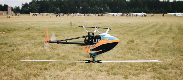 Высший пилотаж в исполнении авиамоделистов Высший пилотаж в исполнении авиамоделистов - Sputnik Беларусь