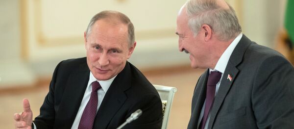 Президенты РФ и Беларуси В. Путин и А. Лукашенко на заседании ВГС Союзного государства - Sputnik Беларусь