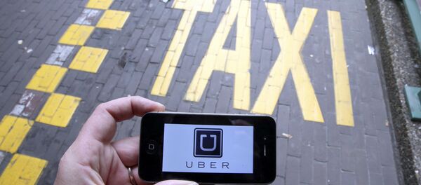 Сервис такси Uber, архивное фото Сервис такси Uber, архивное фото - Sputnik Беларусь