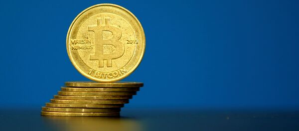 Изображение криптовалюты Биткоин, архивное фото - Sputnik Беларусь