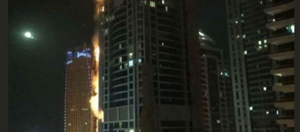 Пожар вспыхнул в одном из самых высоких жилых небоскребов мира Torch Tower («Торч Тауэр») в Дубае Пожар вспыхнул в одном из самых высоких жилых небоскребов мира Torch Tower («Торч Тауэр») в Дубае - Sputnik Беларусь