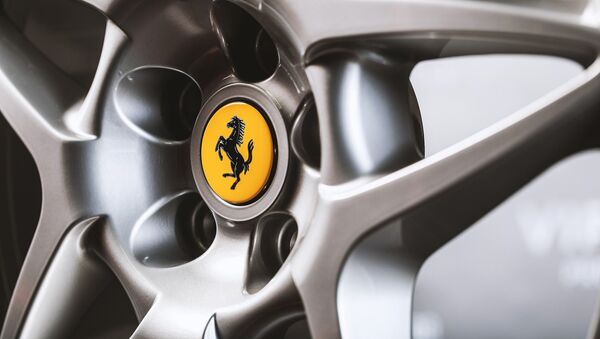 Автомобильный диск с логотипом Ferrari - Sputnik Беларусь