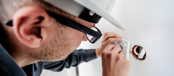 Замена розетки, архивное фото - Sputnik Беларусь