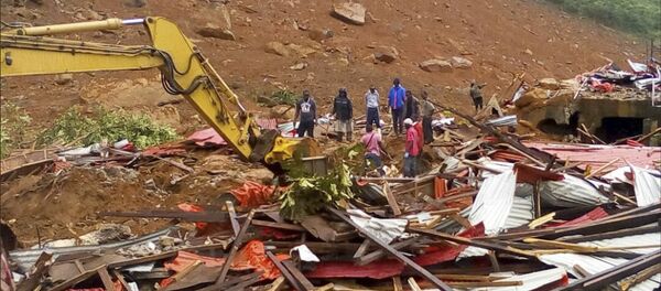 Место оползня в Сьерра-Леоне Место оползня в Сьерра-Леоне - Sputnik Беларусь