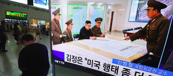 Ким Чен Ын знакомится с планами по пуску ракет в направлении Гуама - Sputnik Беларусь