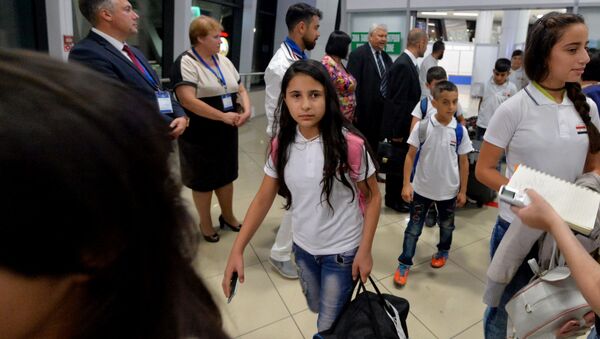 Как встречали сирийских гостей в Национальном аэропорту Минск, смотрите на видео Sputnik - Sputnik Беларусь