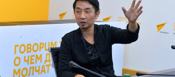 Знаменитый японский композитор Акира Ямаока в пресс-центре Sputnik Знаменитый японский композитор Акира Ямаока в пресс-центре Sputnik - Sputnik Беларусь