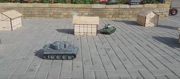 Видео перестрелки игрушечных танков в Гродно выложили в интернет Видео перестрелки игрушечных танков в Гродно выложили в интернет - Sputnik Беларусь