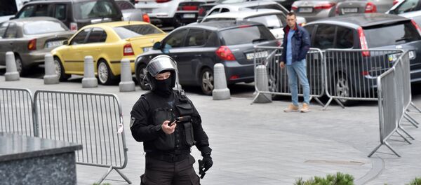 Полицейский в Киеве, архивное фото Полицейский в Киеве, архивное фото - Sputnik Беларусь