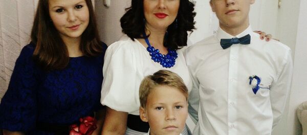 Кристина Данцевич из Скиделя с детьми Кристина Данцевич из Скиделя с детьми - Sputnik Беларусь