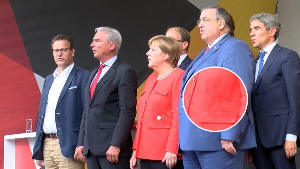Ангелу Меркель атаковали помидорами - Sputnik Беларусь
