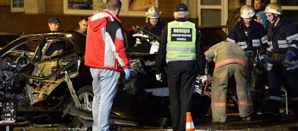 На месте взрыва автомобиля в центре Киева возле Бессарабского рынка На месте взрыва автомобиля в центре Киева возле Бессарабского рынка - Sputnik Беларусь