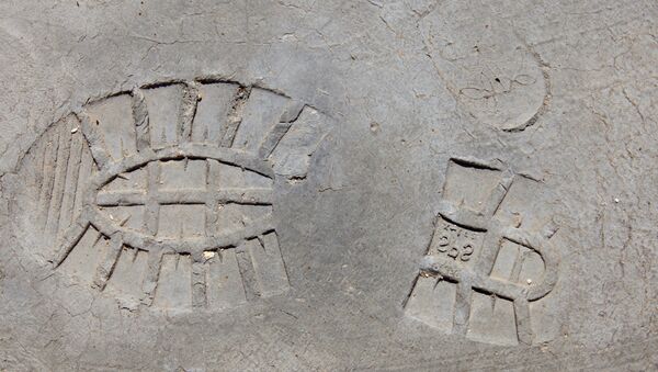 Отпечаток ботинка на бетоне - Sputnik Беларусь
