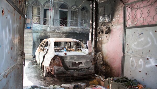 Сгоревший автомобиль в Ираке, архивное фото - Sputnik Беларусь