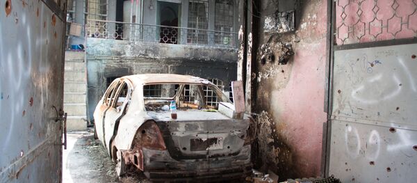 Сгоревший автомобиль в Ираке, архивное фото - Sputnik Беларусь