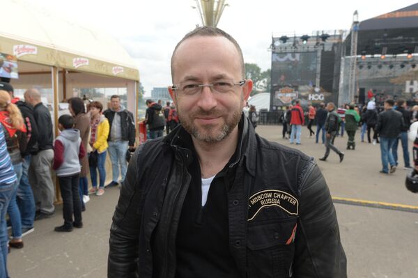 Владелец Harley-Davidson Леонид Федосеев из Москвы все бросил и приехал в Минск - Sputnik Беларусь