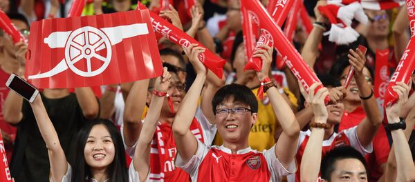 Болельщики футбольного клуба Арсенал (Лондон), архивное фото Болельщики футбольного клуба Арсенал (Лондон), архивное фото - Sputnik Беларусь