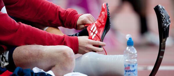 Спортсмен перед стартом забега, архивное фото - Sputnik Беларусь