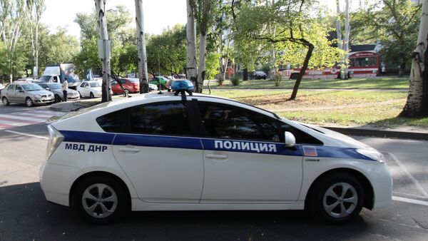 Полицейский автомобиль на одной из улиц в Донецке, архивное фото - Sputnik Беларусь
