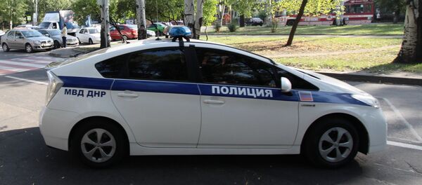 Полицейский автомобиль на одной из улиц в Донецке, архивное фото - Sputnik Беларусь