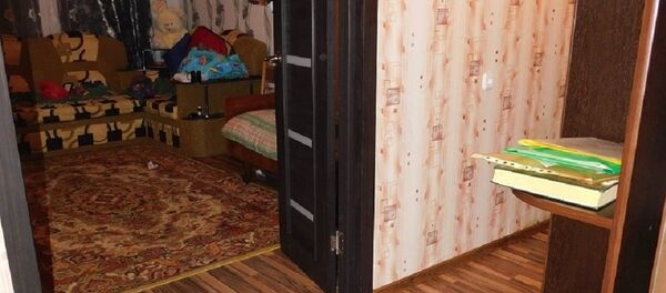 Квартира, в которой трагедией завершились домашние роды Квартира, в которой трагедией завершились домашние роды - Sputnik Беларусь