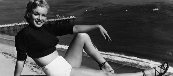 Мэрылін Манро, архіўнае фота 1951 года Мэрылін Манро, архіўнае фота 1951 года - Sputnik Беларусь