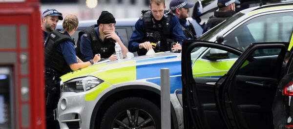 Сотрудники полиции на месте наезда на пешеходов в Лондоне - Sputnik Беларусь