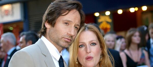 Дэвид Духовны и Джиллиан Андерсон - Sputnik Беларусь