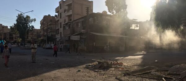 Последствия ракетного обстрела квартала Аль-Кусур в Дейр-эз-Зоре - Sputnik Беларусь