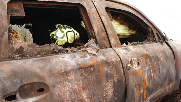 Сгоревший автомобиль, архивное фото - Sputnik Беларусь