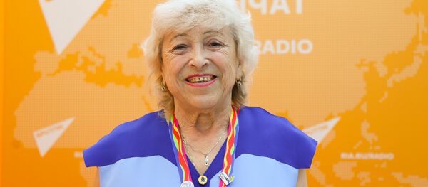 Участница фестиваля молодежи 1957 года посетила стенд Sputnik Участница фестиваля молодежи 1957 года посетила стенд Sputnik - Sputnik Беларусь