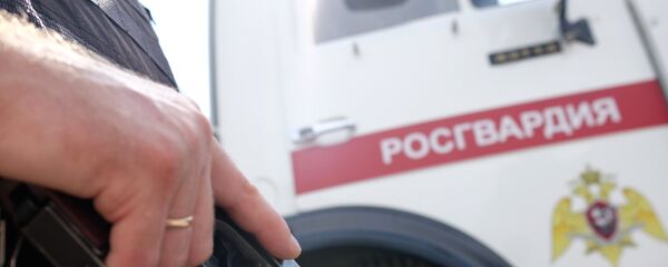 Сотрудники Росгвардии, архивное фото Сотрудники Росгвардии, архивное фото - Sputnik Беларусь