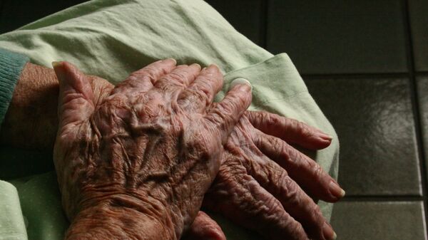 Пожилая женщина, архивное фото - Sputnik Беларусь