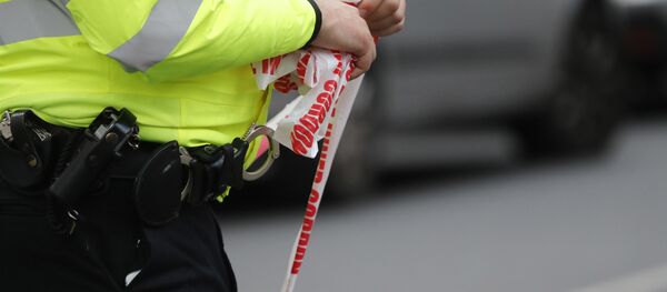 Сотрудник полиции на месте происшествия - Sputnik Беларусь