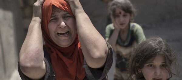 Сирийская беженка с детьми - Sputnik Беларусь