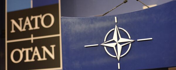 Трибуна в зале для пресс-конференций штаб-квартиры НАТО - Sputnik Беларусь