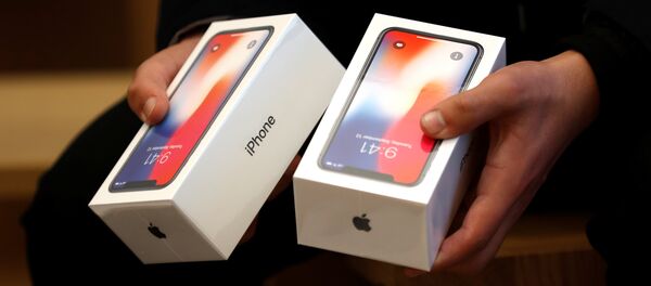 iPhone X в коробках, архивное фото - Sputnik Беларусь