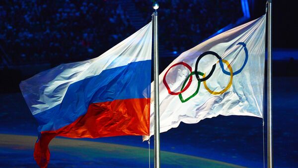 Поднятие российского флага во время церемонии закрытия XXII зимних Олимпийских игр в Сочи - Sputnik Беларусь