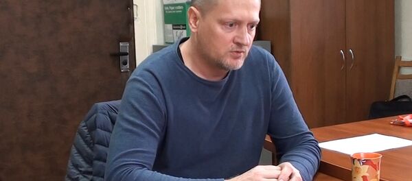 Подозреваемый в шпионаже гражданин Украины Павел Шаройко дает показания в КГБ - Sputnik Беларусь