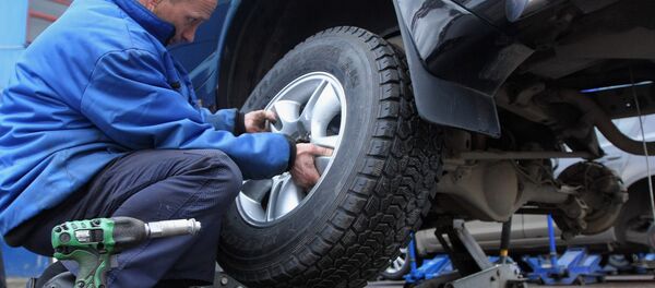 Работа шиномонтажных мастерских, архивное фото - Sputnik Беларусь